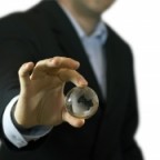 businessman holding globe