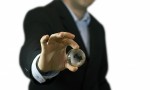 businessman holding globe